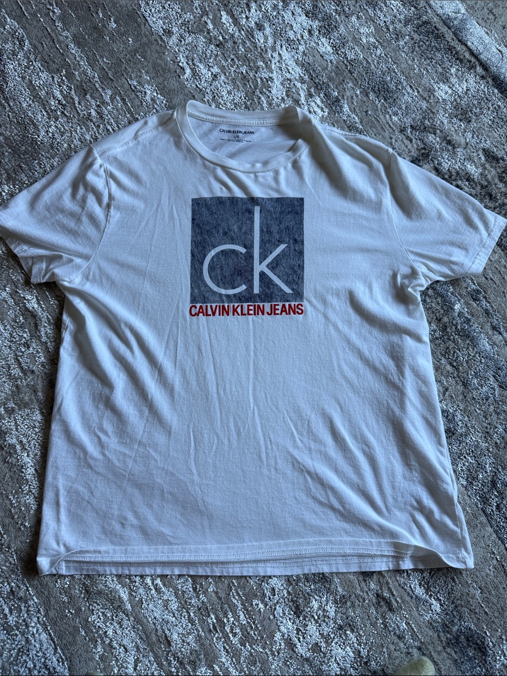 Calvin Klein Jeans White Crewneck Tee with Navy CK Block and Red Logo